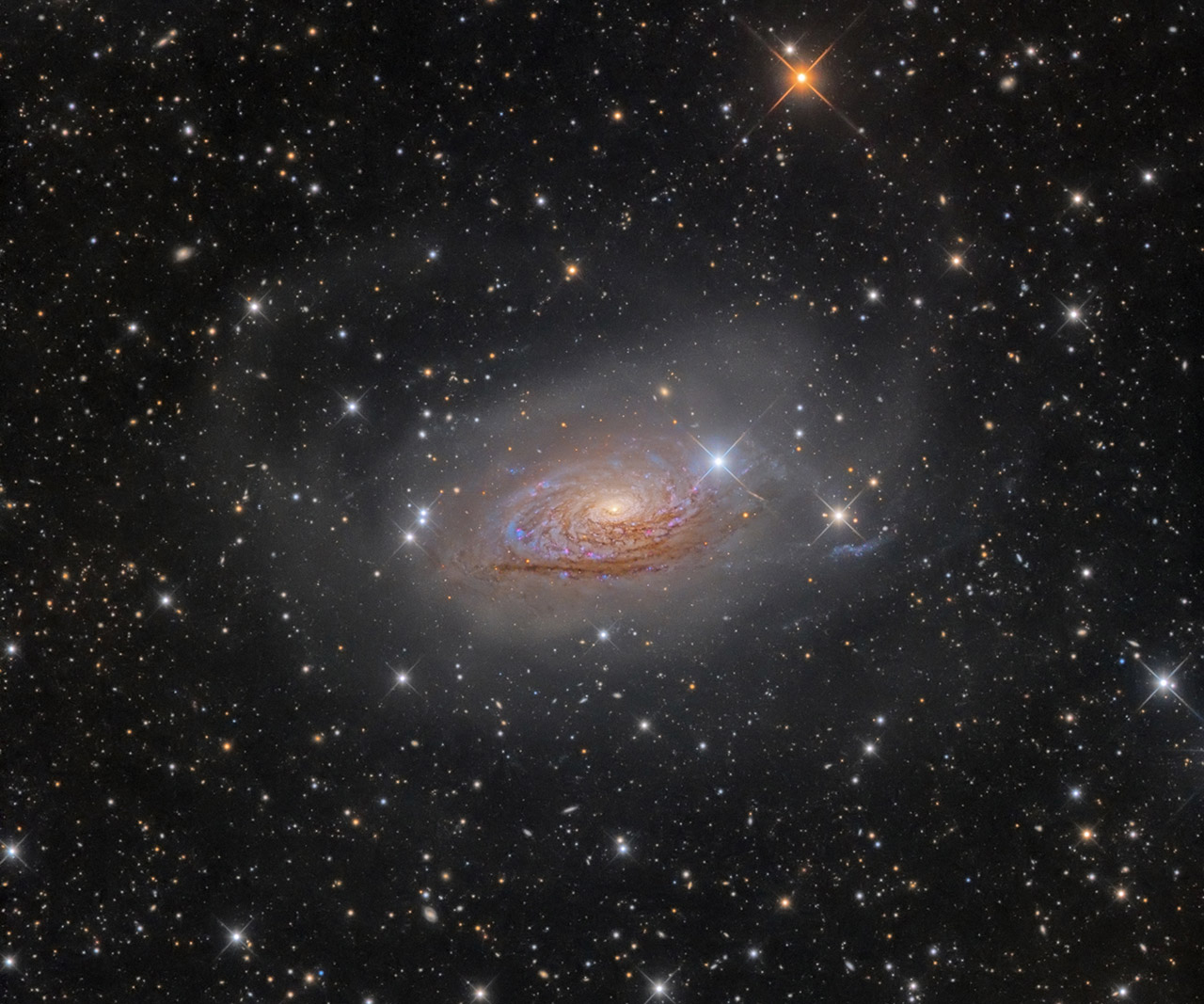 M63: Star Streams and the Sunflower Galaxy, © Oleg Bryzgalov, Ukraine, Winner in category Galaxies, Astronomy Photographer of the Year 2017 Winner
