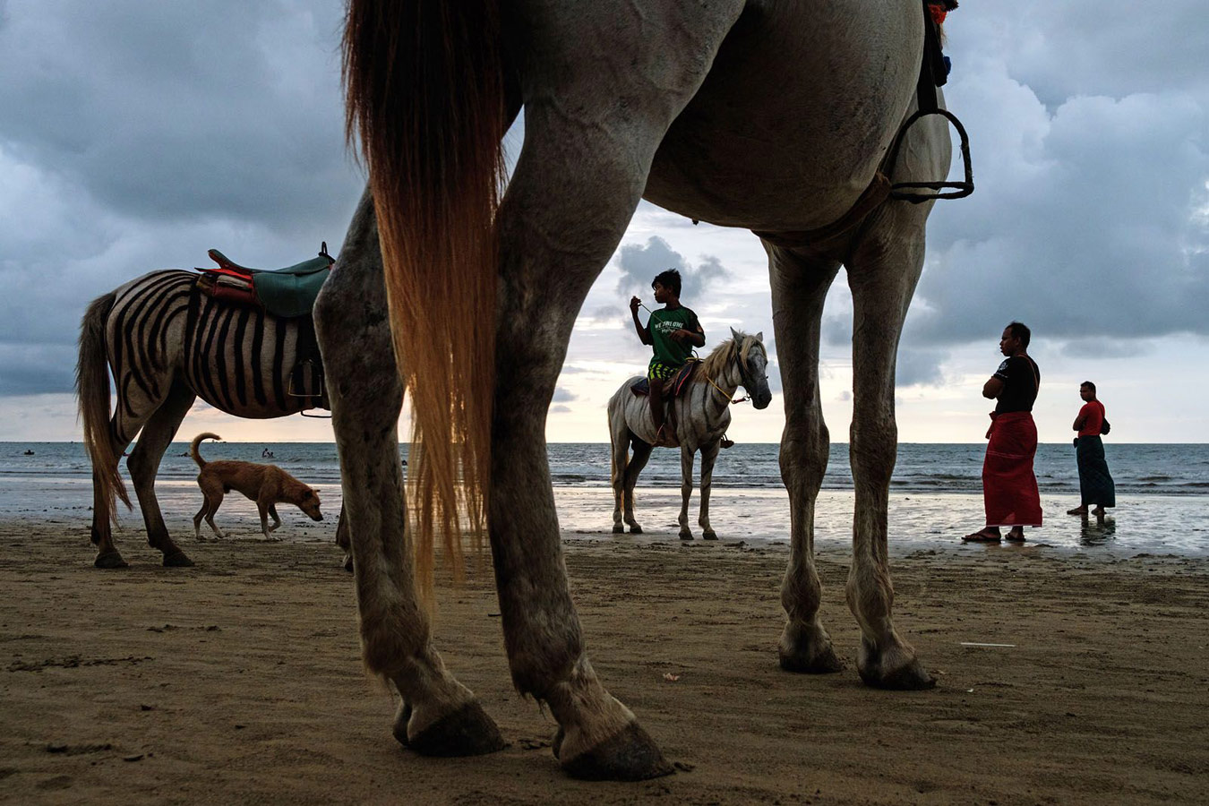 Beach Scene, Chaung Tha, Myanmar, © Maciej Dakowicz, Poland, 1st Place Single, LensCulture Street Photography Awards
