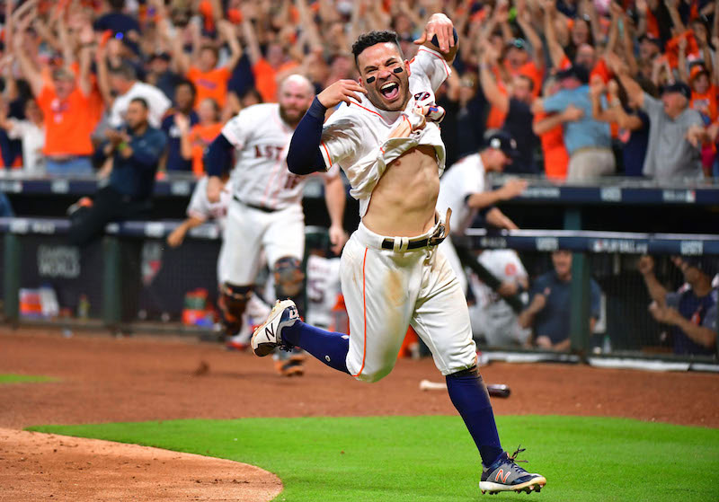 Home Plate Celebration, © Kevin Dietsch / United Press International, First Place Category: Sports Feature, Pictures of the Year International — POY
